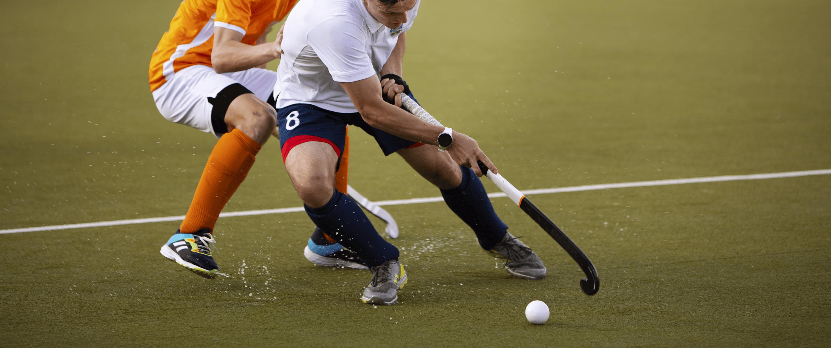 Image d’ambiance Umpire Academy – joueurs de hockey sur gazon en action